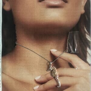 14K white gold yellow sapphire seahorse pendant